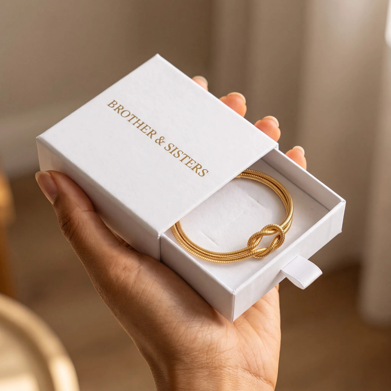 Knot Couple Bracelet by Brother & Sisters in gold gift box