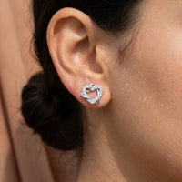 Thumbnail for Close-up of the silver stud earrings worn on the skin | SKU: 4478648-platinum-plated-clear