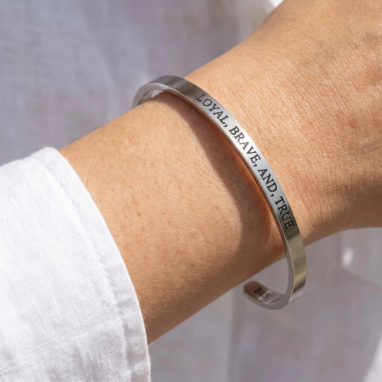 Loyal brave true — close-up of the details, silver | SKU: lbat-wg
