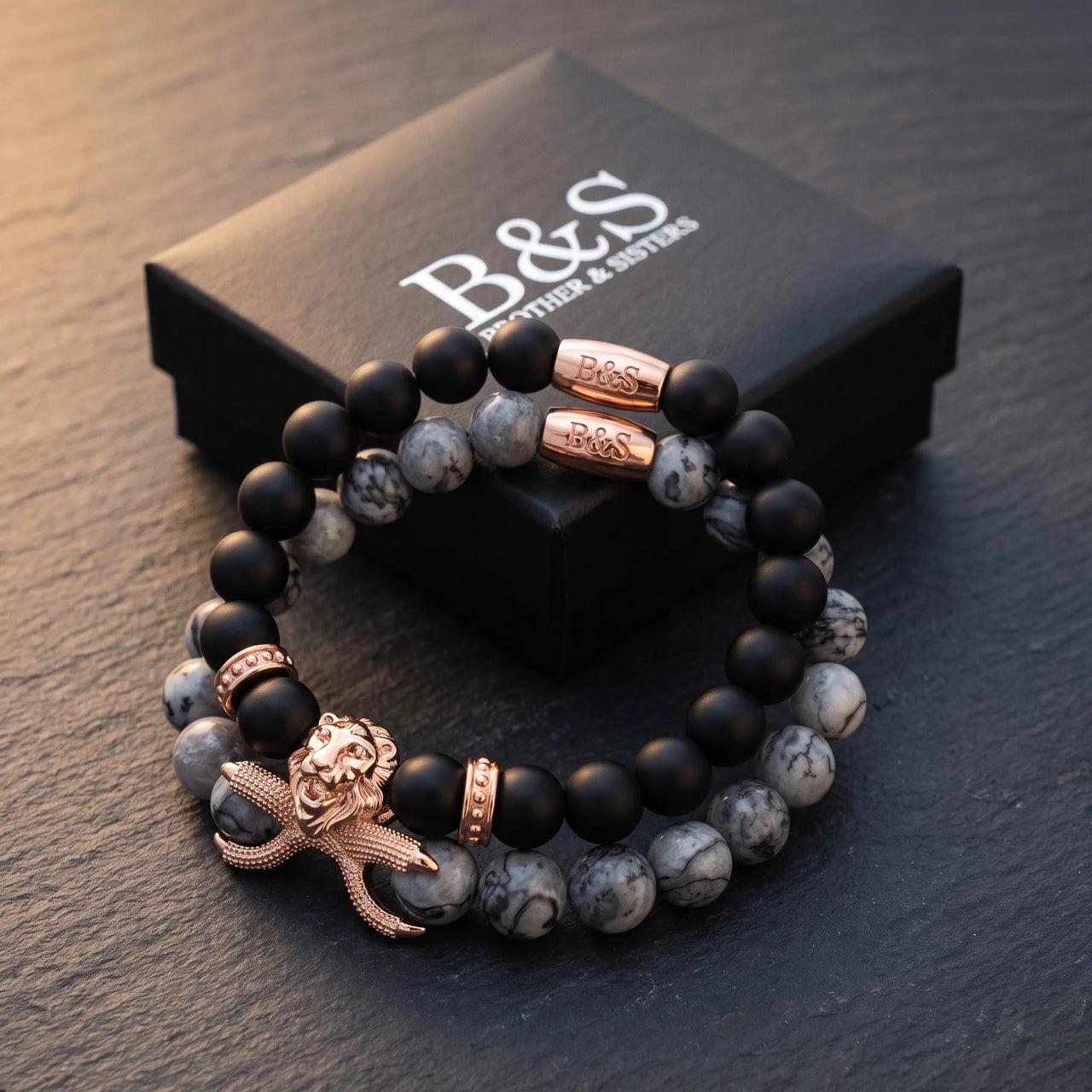 Rose Gold Lion with Black & Grey Stones Set – in the Brother & Sisters gift box | Brother & Sisters | SKU: 21369621-rose-gold-XS-14-15, 21369621-rose-gold-S-16-17, 21369621-rose-gold-M-18-19, 21369621-rose-gold-L-20-21, 21369621-rose-gold-XL-22-23