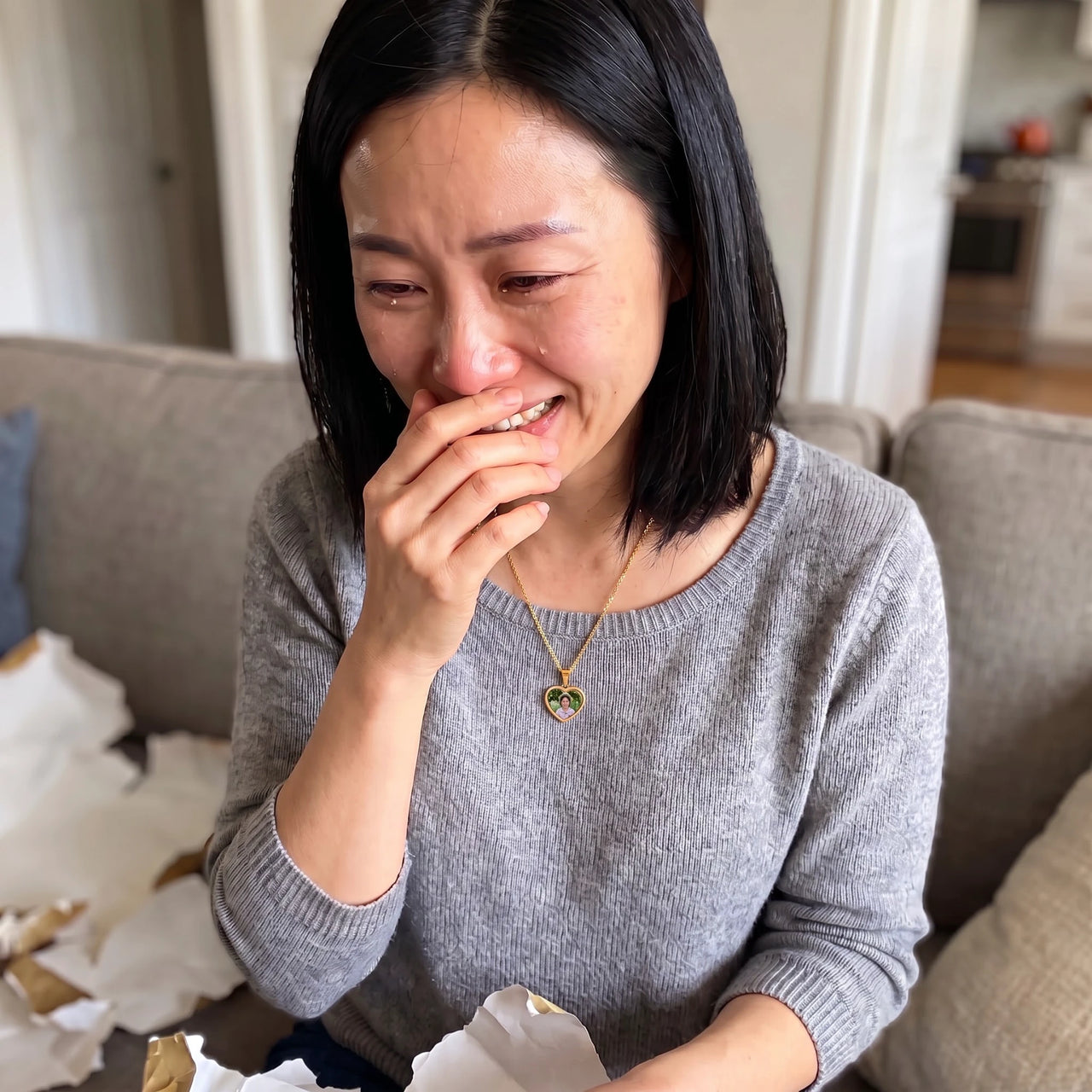 Woman moved to tears after unwrapping the gold secret heart photo necklace | SKU: TPH-CHTN-GOLD-SMALL