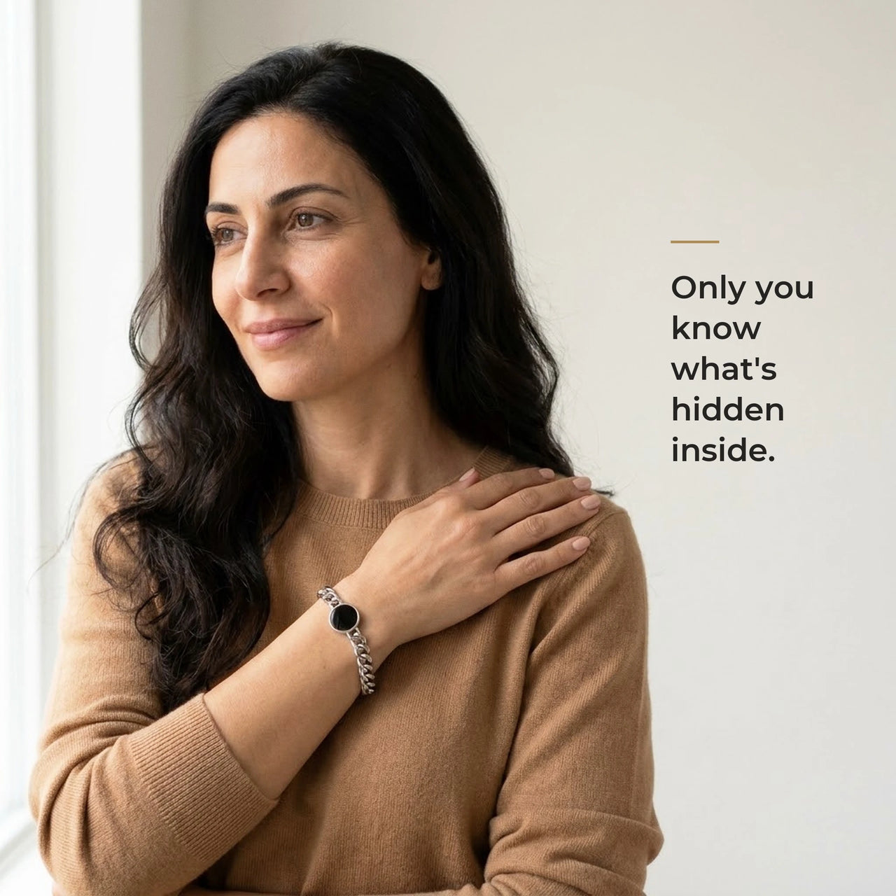 Woman wearing the silver bracelet with its black round charm, only she knows the photo inside | SKU: TPH-RNDB-SILVER